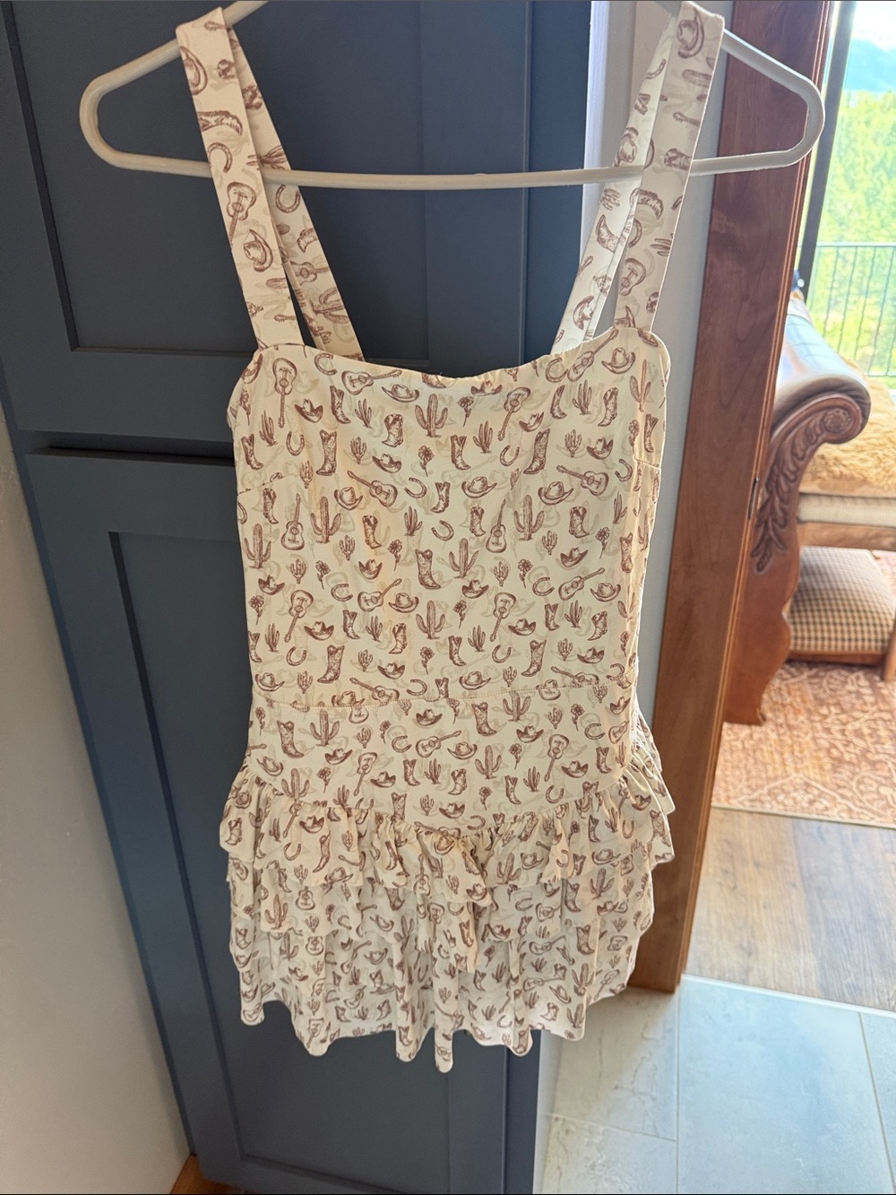 Women’s Cream Printed Ruffle tennis dress.